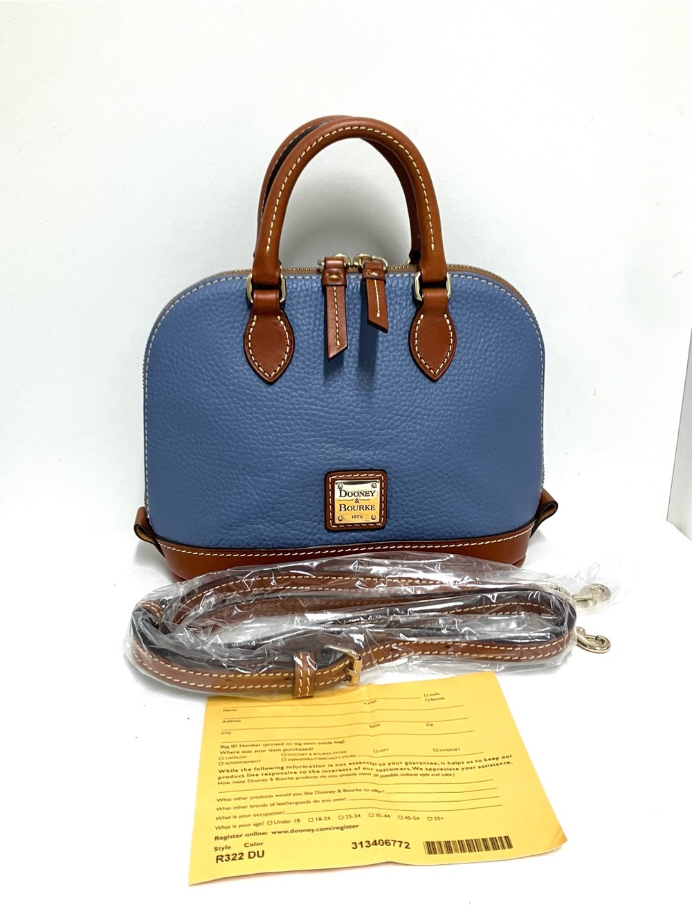 Dooney & Bourke Pebbled Leather Bitsy bag blue color